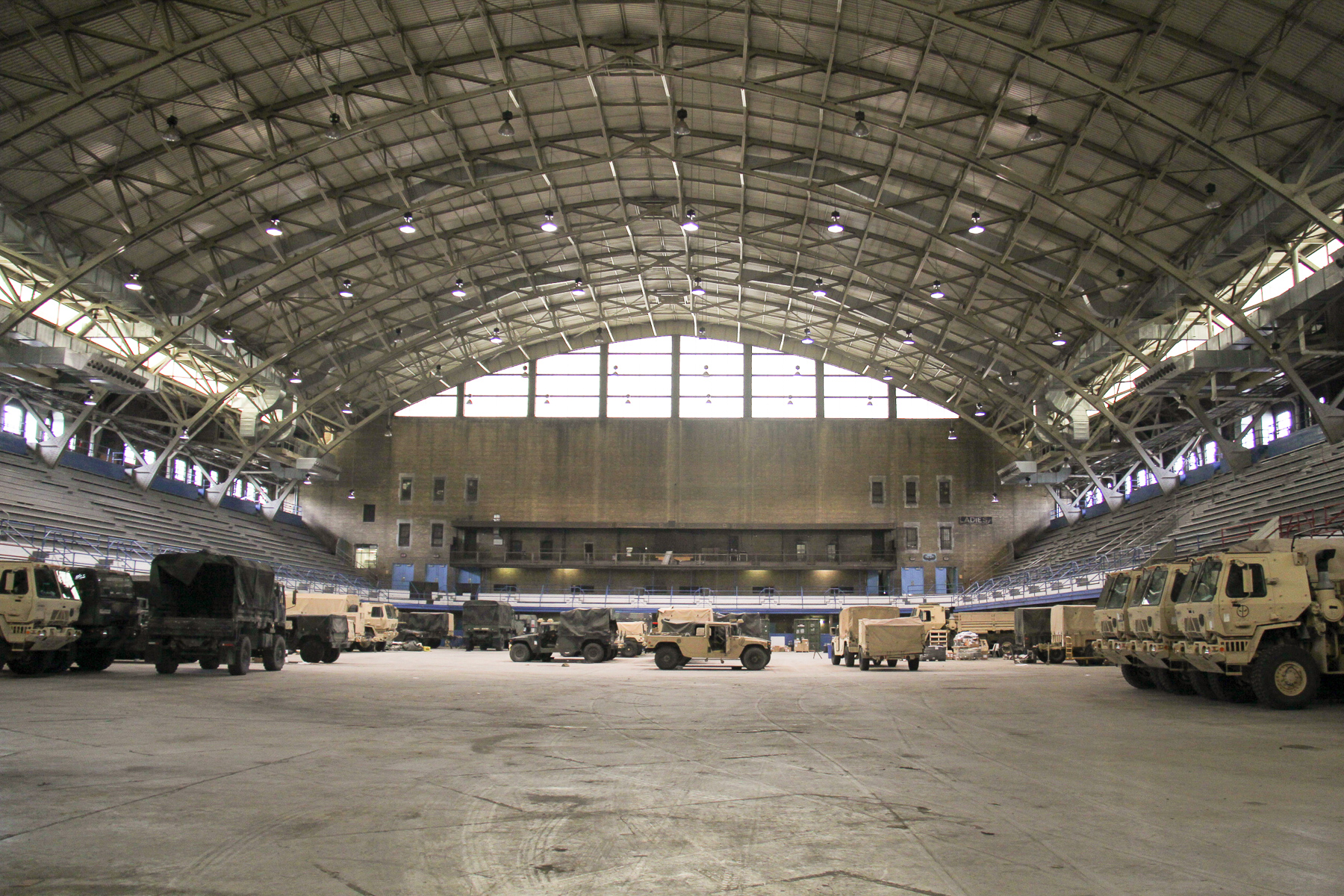 Military vehicles currently occupy the large arena at the General Richard L. Jones Armory in preparation for the 2nd Battalion 178th Infantry's deployment to Afghanistan this month.