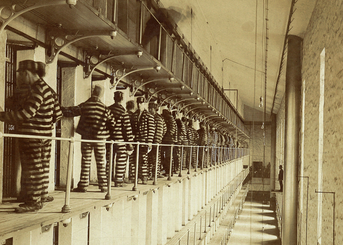 Prisoners line up outside of their cells circa 1890. (Courtesy of the Joliet Area Historical Museum)