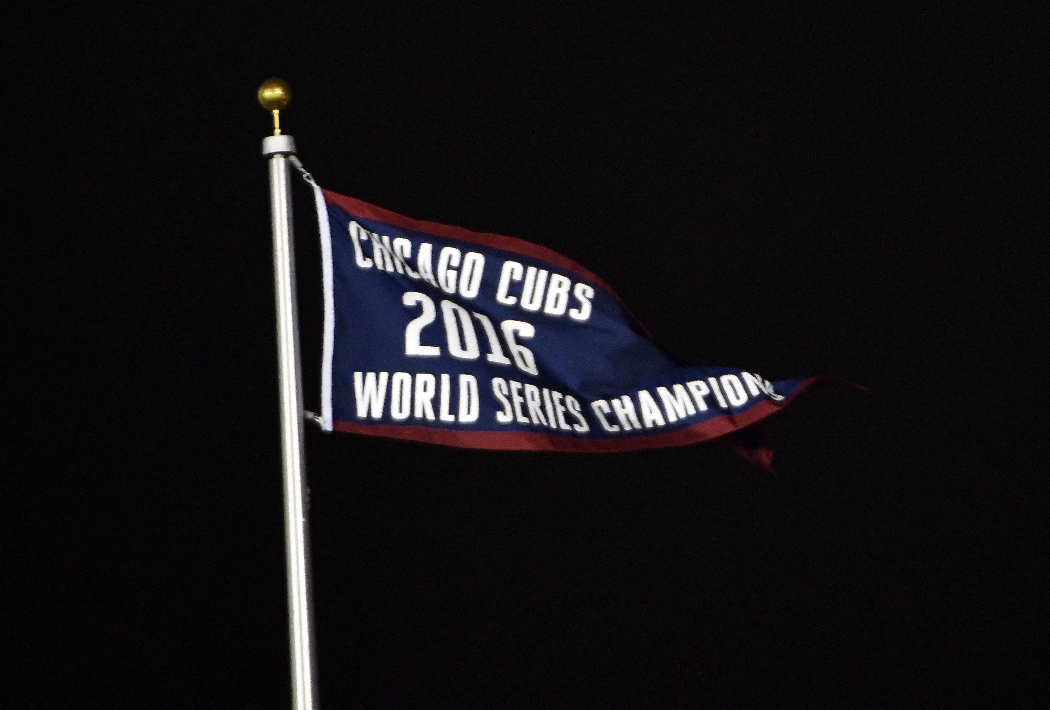 PHOTOS: Cubs Raise Championship Banner At Wrigley