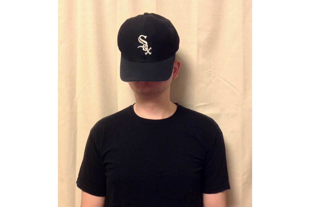 white sox hat on head