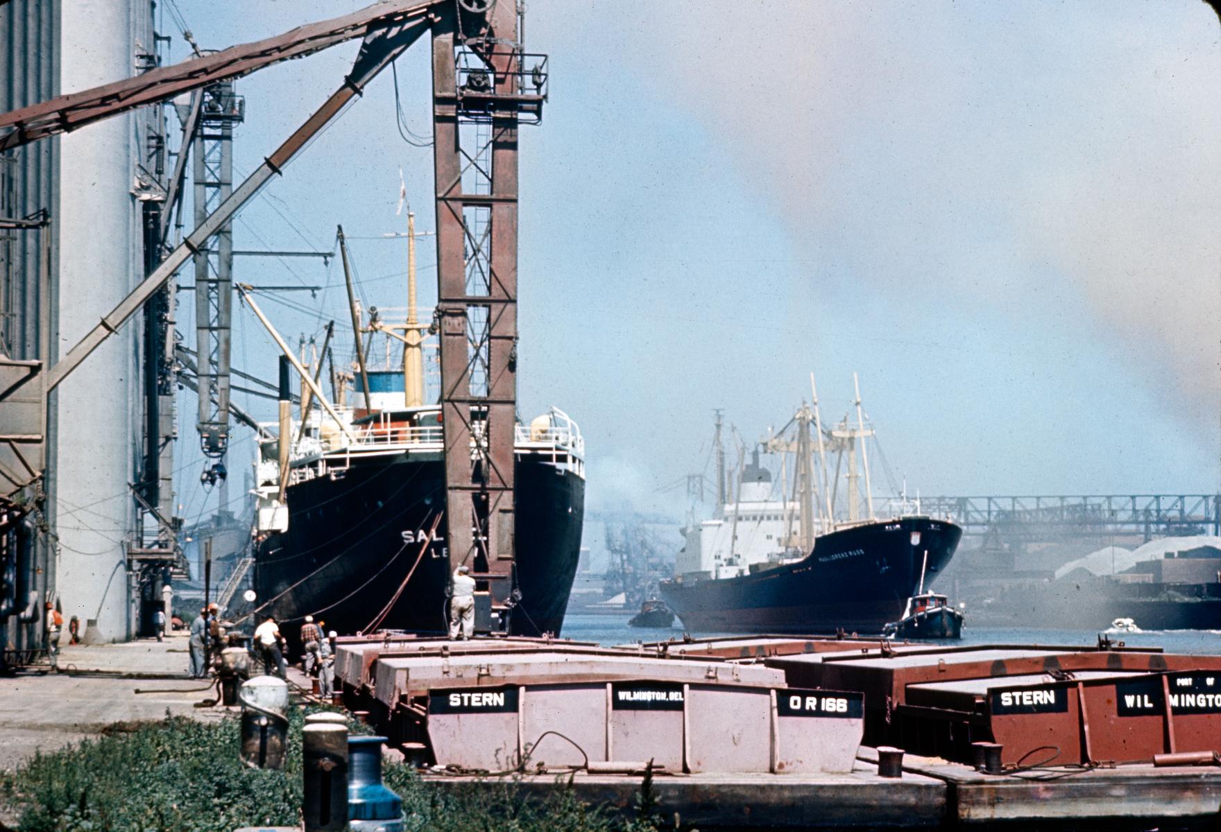 Barges, ships, loading docks and cargo-handling facilities at the Port of Chicago in 1969, during the heyday of Great Lakes shipping. (Courtesy C. William Brubaker Collection, bru012_10_dF, Special Collections, University of Illinois at Chicago Library)