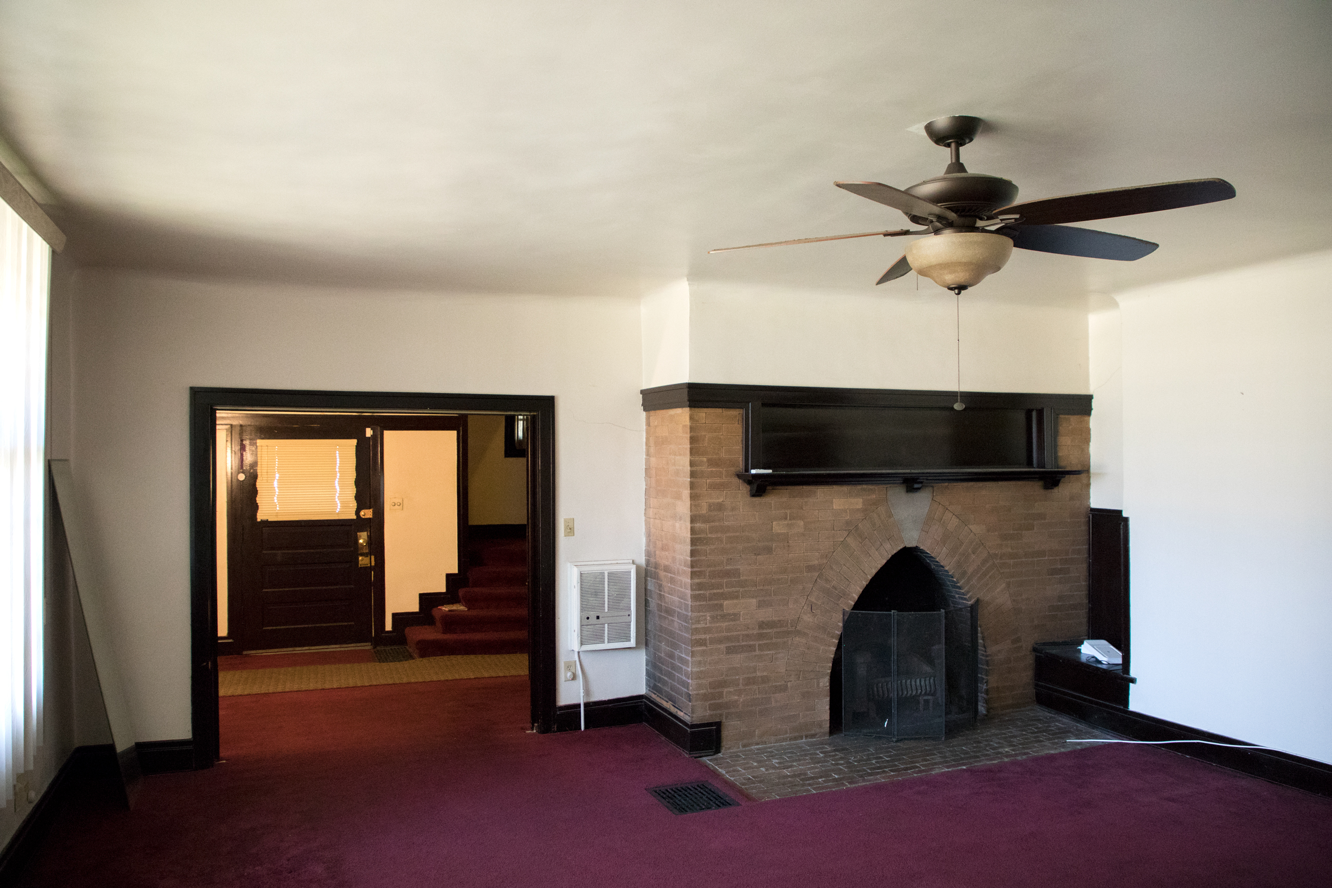 The living room features a central fireplace, a common focal point in Frank Lloyd Wright homes.
 (Andrew Gill/WBEZ)