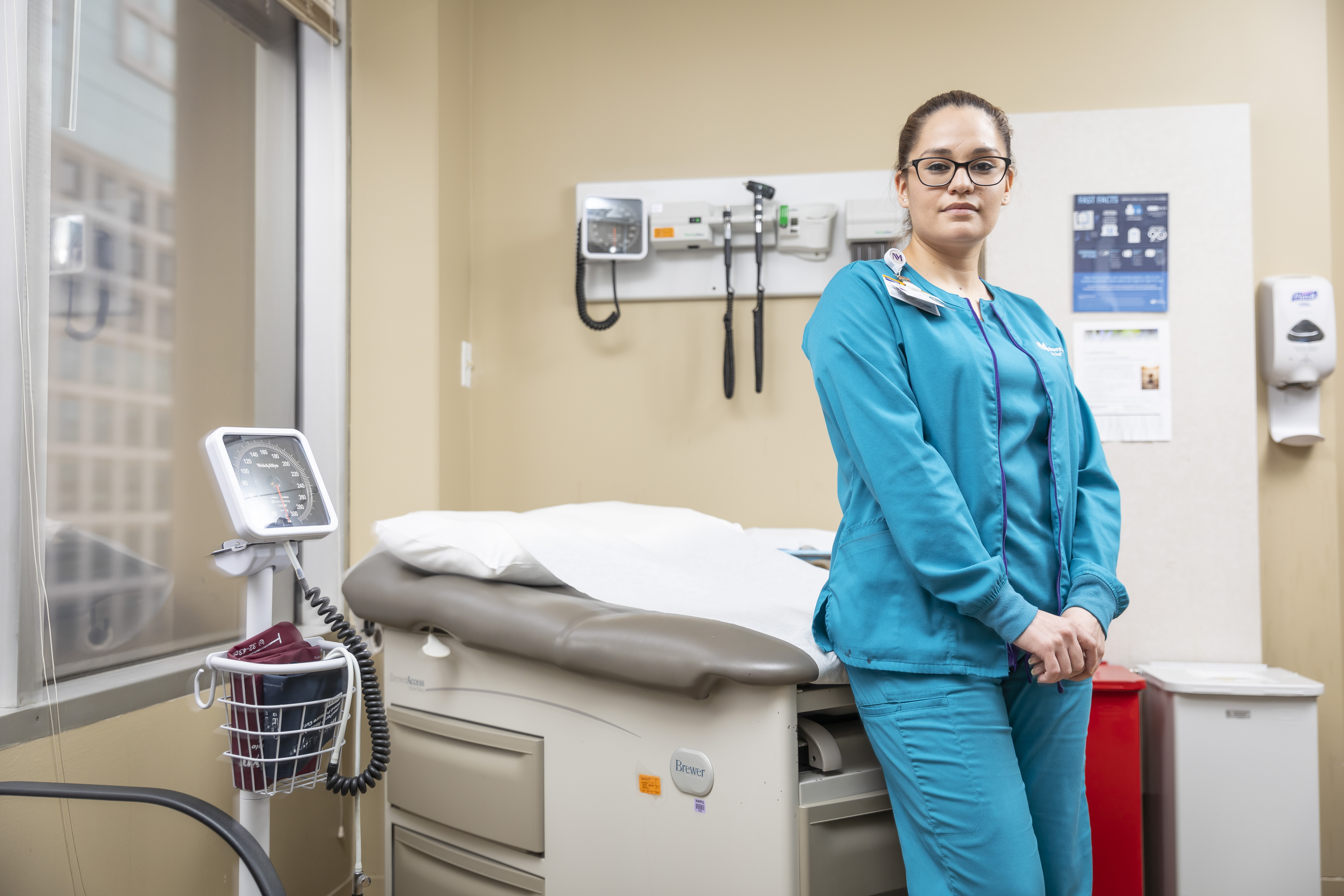 Yessica Roman, a medical assistant at Northwestern's integreative medicine program, said this month that she felt well prepared for her new job after graduating from Malcolm X College. (Martinez/WBEZ)