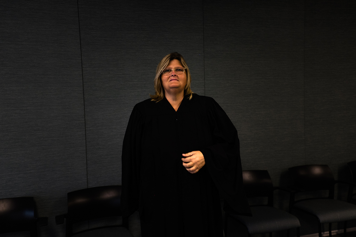 Judge Colleen Sheehan stands in the courtroom. (Sebastián Hidalgo/City Bureau) Sheehan worked to bring a restorative justice court to Cook County under a directive from Chief Judge Timothy Evans.