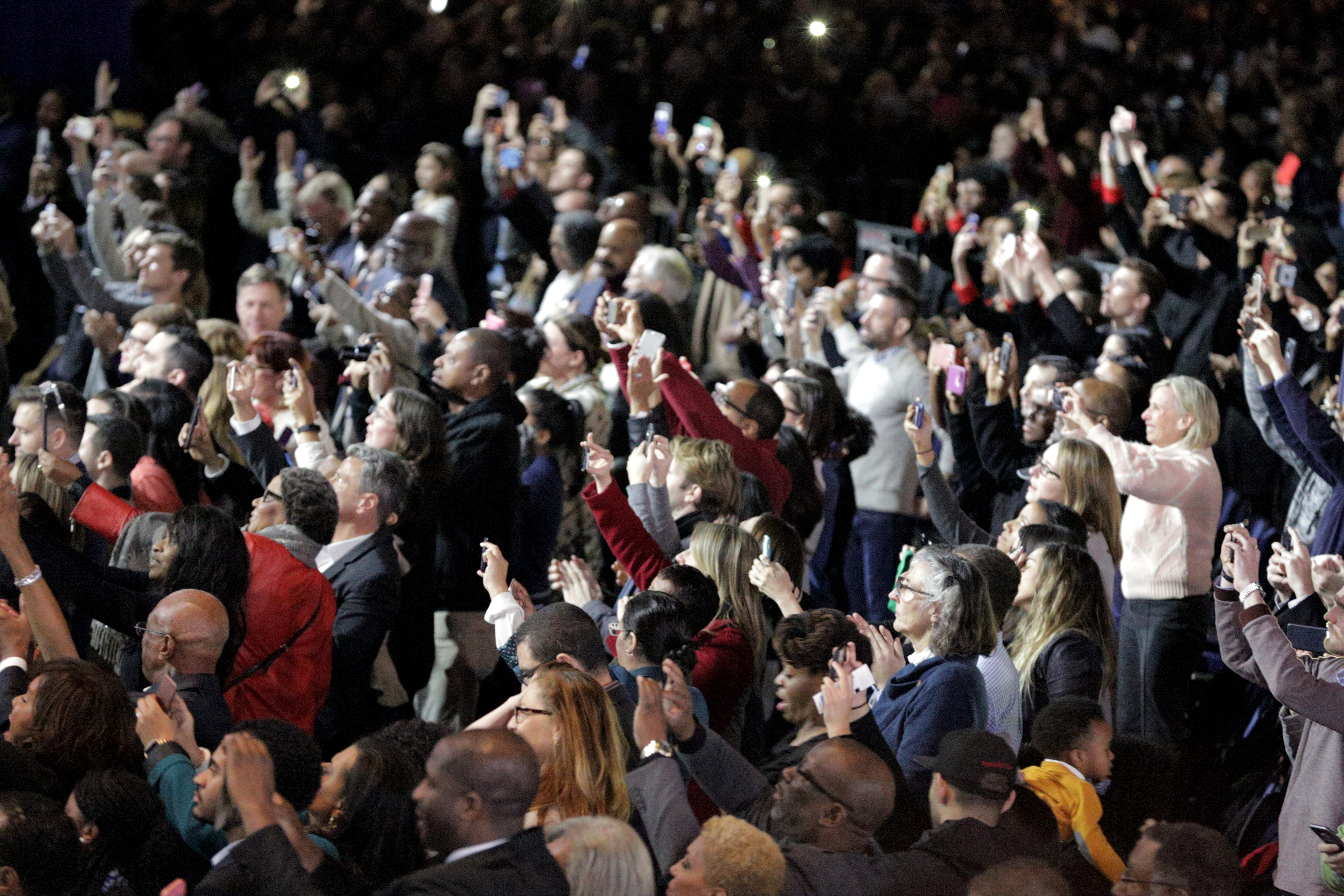 The crowd at McCormick Place reacts to Barack Obama during his farewell speech Tuesday in Chicago. (Andrew Gill/WBEZ)