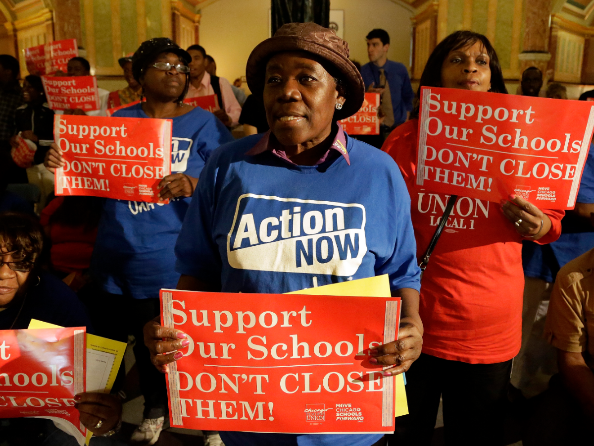 Protesters of Mayor Rahm Emanuel's plan to close dozens of city schools rallied at the Illinois State Capitol Wednesday, May 22, 2013 in Springfield. The Chicago Board of Education ultimately voted to close 50 schools.